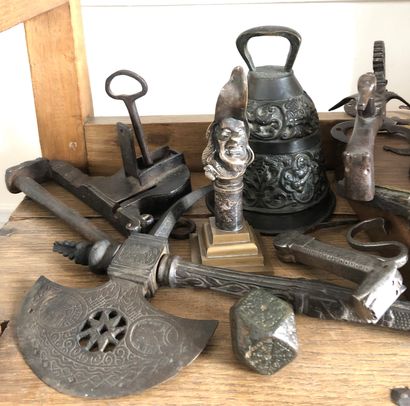 null Set of metal trinkets including bells, axe, head and various elements