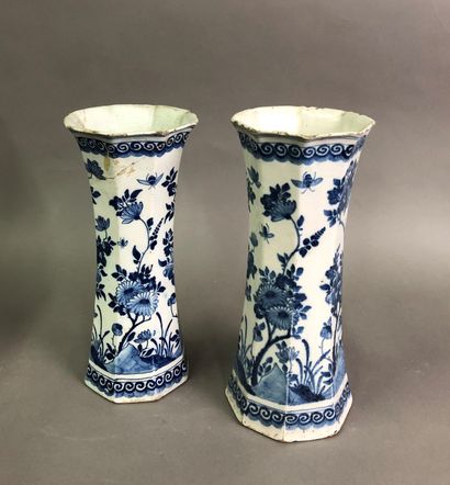  Pair of Delft earthenware cornet vases decorated with flowers and foliage 
Accidents...