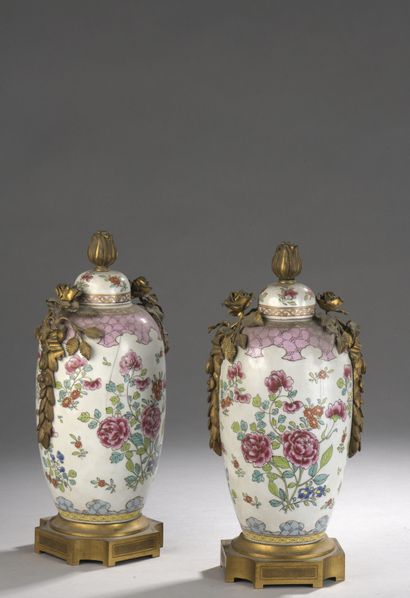 Pair of porcelain vases mounted in gilt bronze...