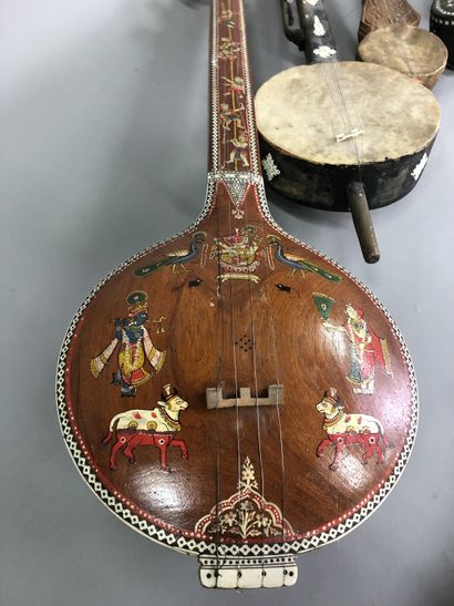 null Four sitars and an Asian string instrument

Wood, bone, skin, one painted.

L:...