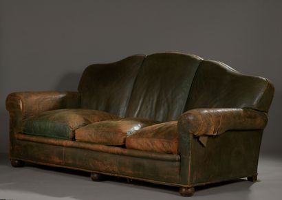 null Comfortable sofa with a moving backrest upholstered in green leather (used),...