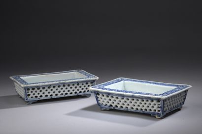  Pair of rectangular shaped porcelain bowls or benches, the sides openwork, the top...