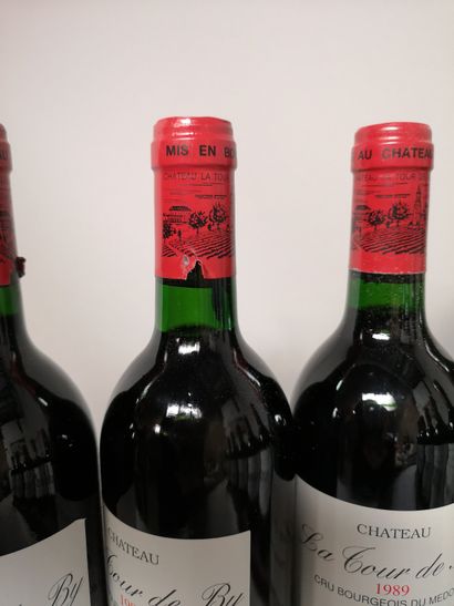 null 12 bouteilles Château La TOUR de BY - Médoc 1989. En caisse bois.

3 étiquettes...