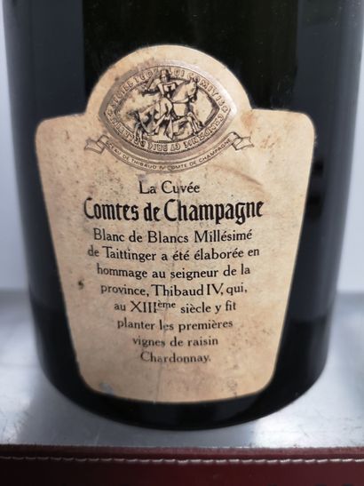 null 1 bouteille CHAMPAGNE TAITTINGER Comtes de Champagne 1986 

Etiquette légèrement...