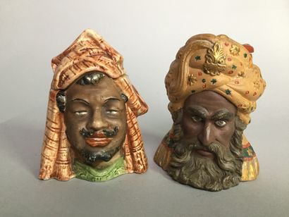 null Lot of 9 tobacco pots including : 

- Head of an Arab Prince, with full beard,...