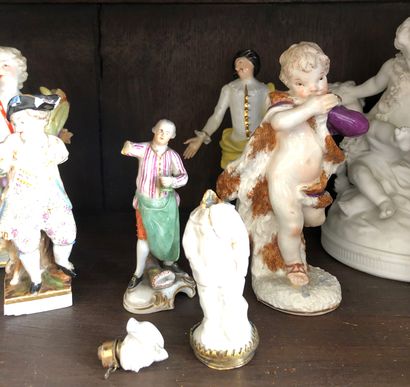 null Ten porcelain figurines, mainly from German factories, including a perfume bottle...