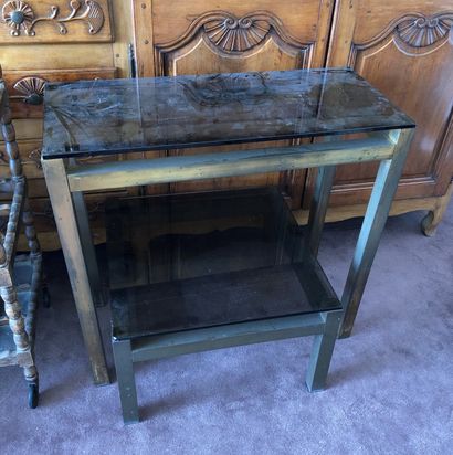 null Console and small coffee table

Bronze and gilt brass, smoked glass top

Damage...