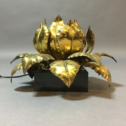 null Lamp in the shape of a lotus flower made of brass leaves fixed on a square base...
