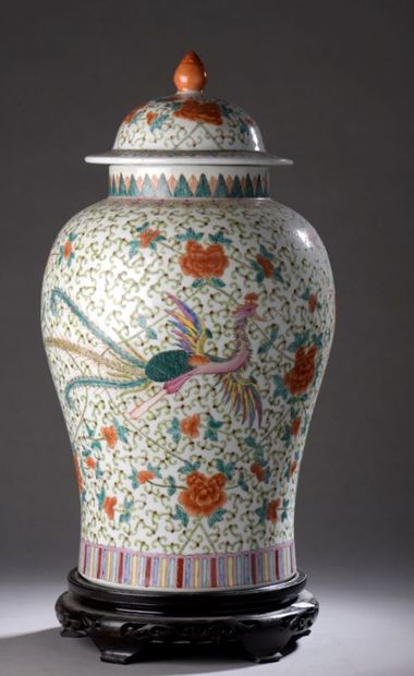 null A large covered baluster porcelain vase decorated with polychrome enamels of...
