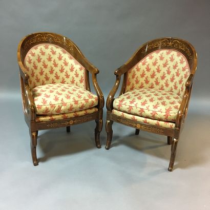 Pair of gondola armchairs. 
In varnished...