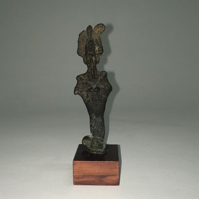 null Bronze Osiris. 

Egypt, Late Period. 

Damage and missing parts

Green crusty...