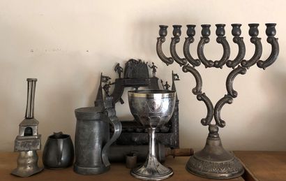 null A set of eight Hebrew ritual objects, mainly in pewter, including a pitcher,...
