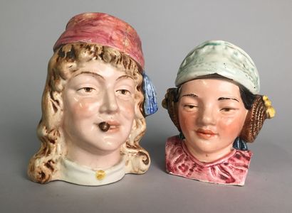 null Lot of 9 tobacco pots including : 

- Head of a bearded bourgeois with hat and...