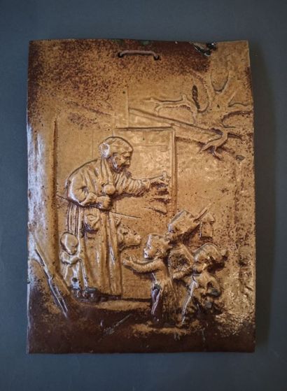 null School of the 19th century.

The visit

Plate in bas-relief in enamelled terracotta.

34,5...