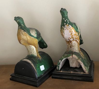 null CHINA

Pair of ridge tiles with bird motifs 

Glazed earthenware with green...
