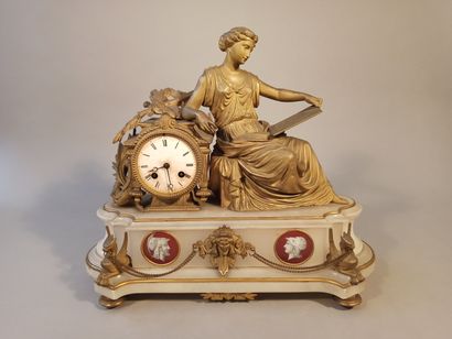 null Gilded regule clock with allegorical figure of sciences, enamelled dial with...