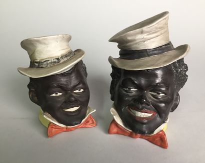 null Black New Orleans musician's head, smiling, with top hat. 

Painted biscuit

Circa...