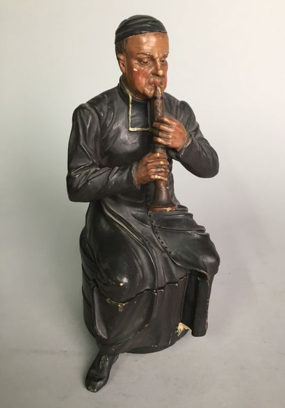 null Parish priest playing clarinet (foot to stick) 

Painted terracotta

NO. BB...
