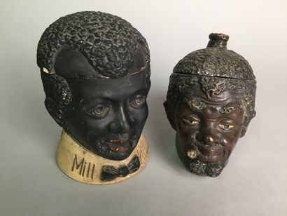 null Black man's head, bald and cigar at the corner of his mouth.

Painted terracotta

Marked...