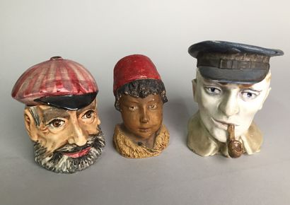 null Pipe-smoking man's head, with a cap. 

Glazed earthenware

Circa 1900 

Small...