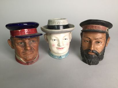 null Head of a postal worker, bearded and mustached, with a cap. 

Painted terracotta...
