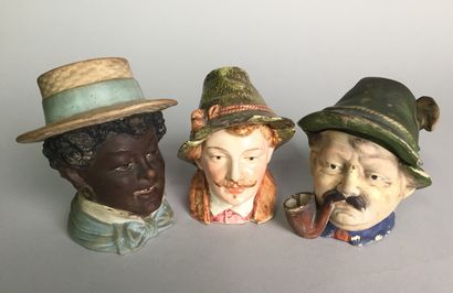 null Moustached man's head, with pipe and Tyrolean hat. 

Painted terracotta

Circa...