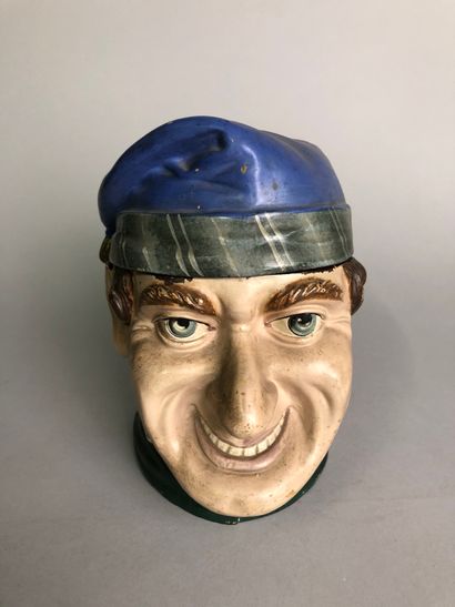 null Smiling, distinctive head with Dutch miller's headdress. 

Polychrome terracotta

No....