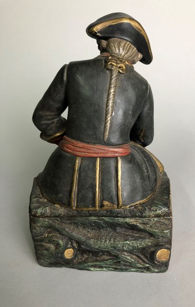 null Officer in a suit sitting on a tree trunk, under observation. 

Painted terracotta

NO....