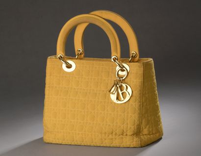 null CHRISTIAN DIOR by JOHN GALLIANO, 1997

Lady Dior bag in mango nylon with cane...