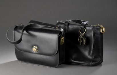 null CHRISTIAN DIOR

- a Lady Dior bag in black lambskin leather, zipper, double...