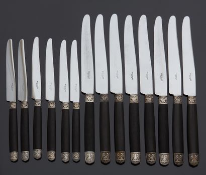 null Set of twelve table knives and six dessert knives, ebony handles, ferrules and...