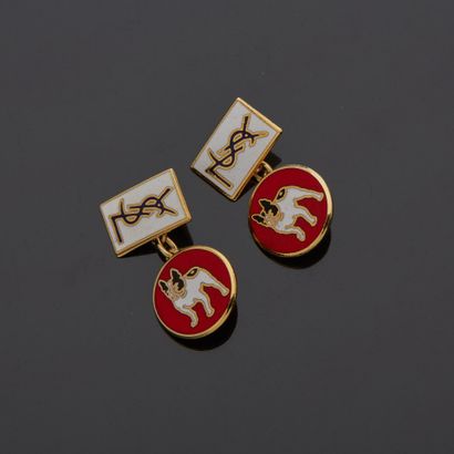 null Lot including :

- YVES SAINT-LAURENT - Pair of double gilt metal cufflinks,...