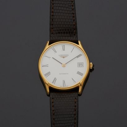 null LONGINES - Gilt metal and steel men's wristwatch, round shape, signed white...