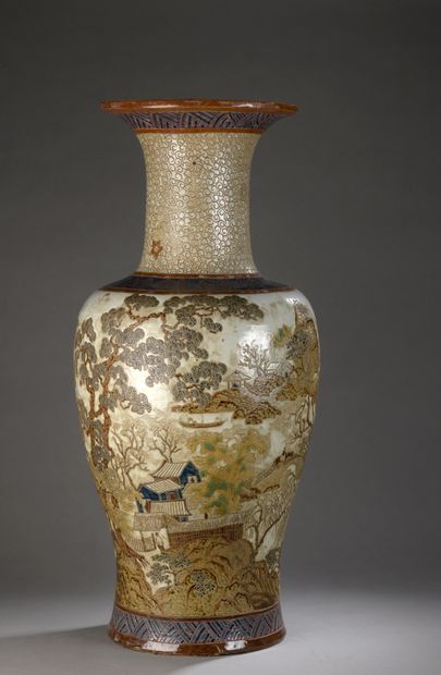 null A MONUMENTAL VASE of phoenix tail shape with a flared neck in brown and blue...