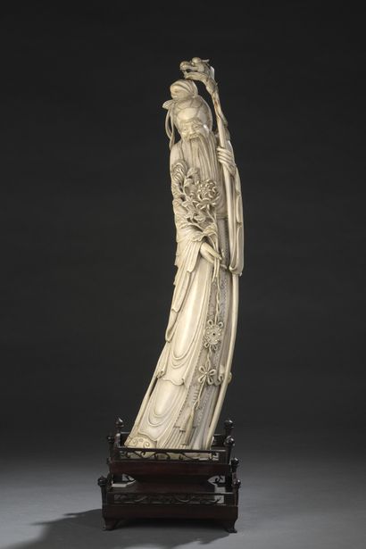 Ivory STATUTE depicting a standing Immortal,...