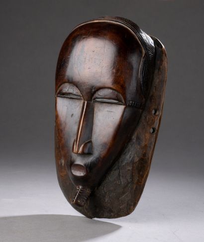 null BAOULE MASK, Ivory Coast


Hardwood with a glossy brown patina, accidents.


L....
