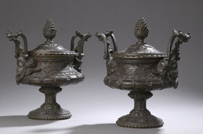 null Pair of covered urns with pedestal and two handles, decorated with female masks,...