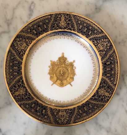 null SEVRES 


Porcelain plate, blue wing, gold border and Empire coat of arms in...