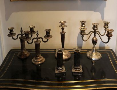 null Lot including : 


A pair of candelabras 


A pair of torches


One candelabra...