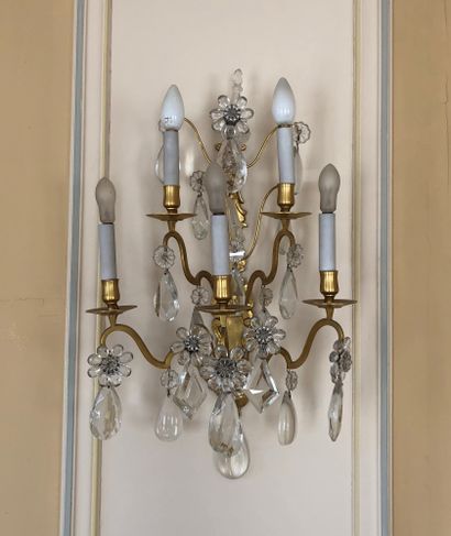 null A pair of five lights sconces on two rows in bronze and gilt brass, water drops...