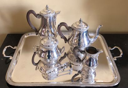 null A silver tea-coffee set including : 


- A teapot


- A coffee pot 


- A sugar...