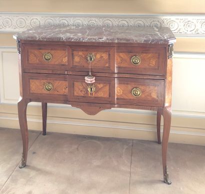 null Jumper chest of drawers with central projection, made of veneer and floral marquetry...
