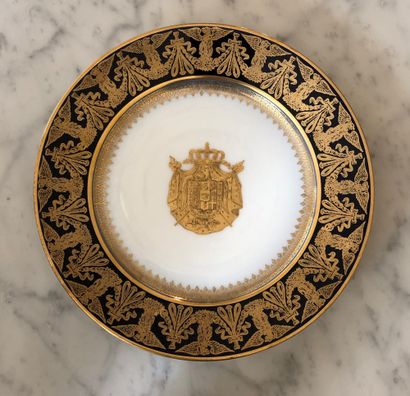 null SEVRES 


Porcelain plate, blue wing, gold border and Empire coat of arms in...
