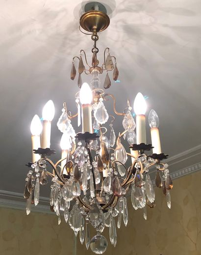 Chandelier with eight arms of light and pendants....