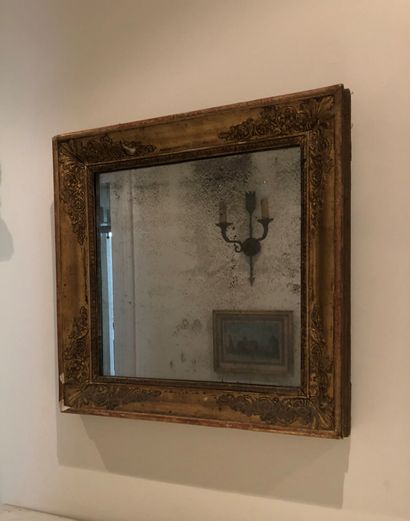 null Set of three mirrors in gilded wood frames.


19th century 


84 x 76 cm and...