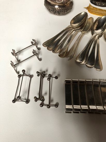 null Lot including :


In silver: Eleven place settings and a spoon in the model,...