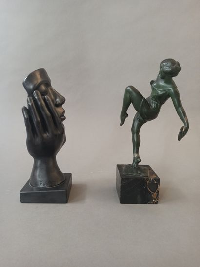 null Bronze statuette with green patina showing a dancer with cymbals


Signed Fayral,...
