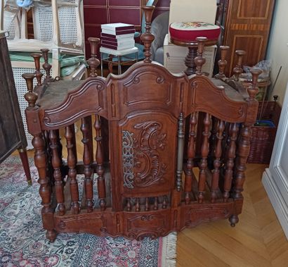 null A walnut spindle door with mouldings and carvings of rocaille motifs and scrolls....