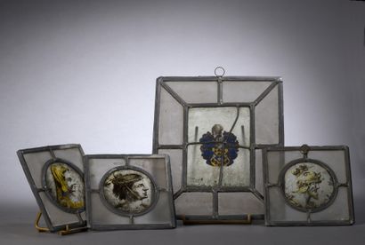 null Suite of three round stained glass windows decorated with heads in profile of...