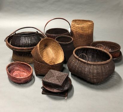 Set of eleven woven baskets and eleven coasters....